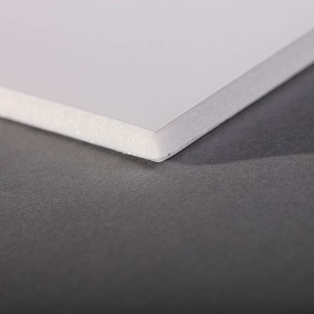 Stack of craft white foam board / Foamboard - used for mounting